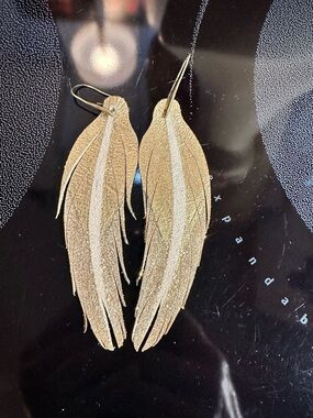 Handmade Boho Leather Feather Metallic and sparkly earrings